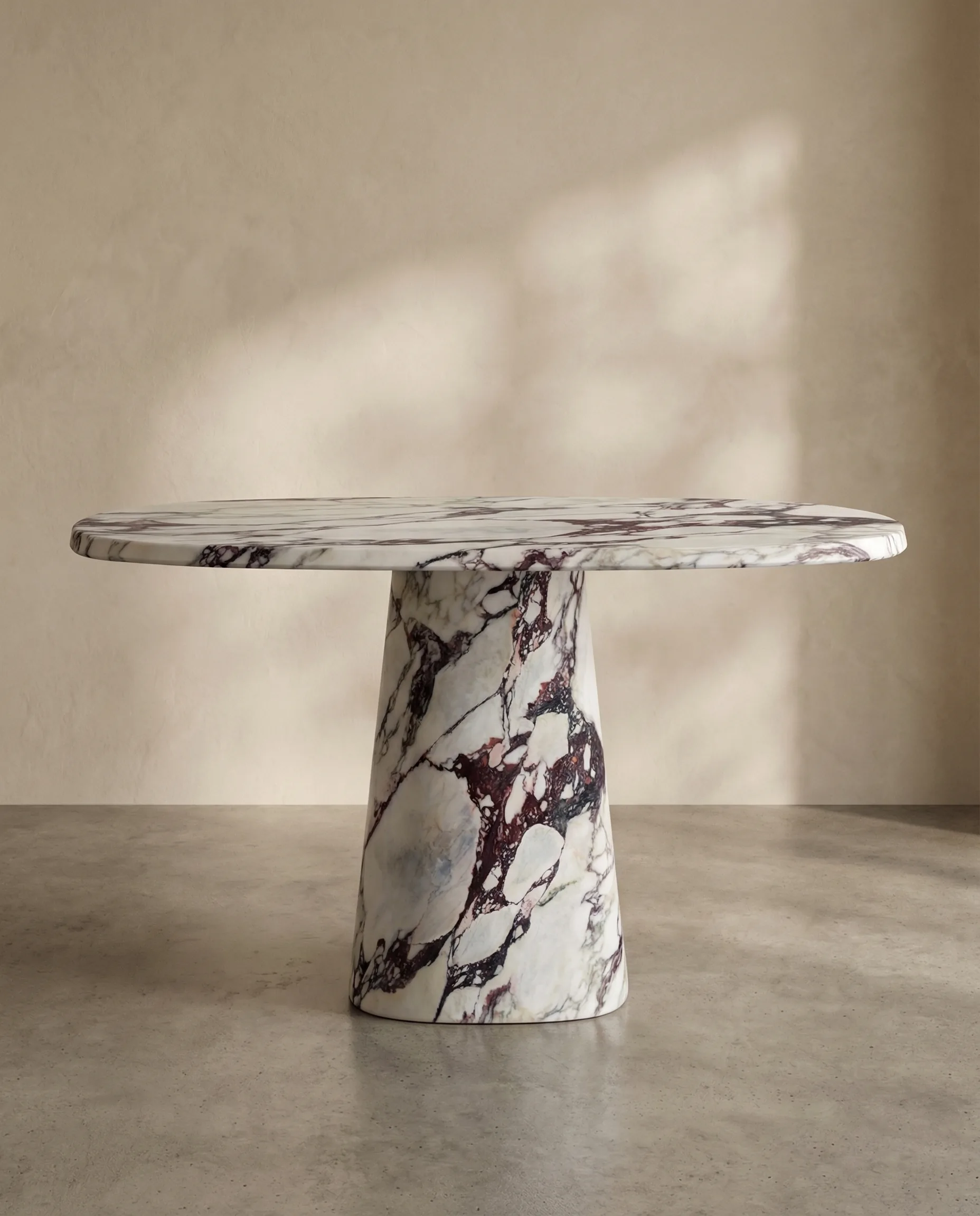 Wedge Dining Table in Calacatta Viola marble